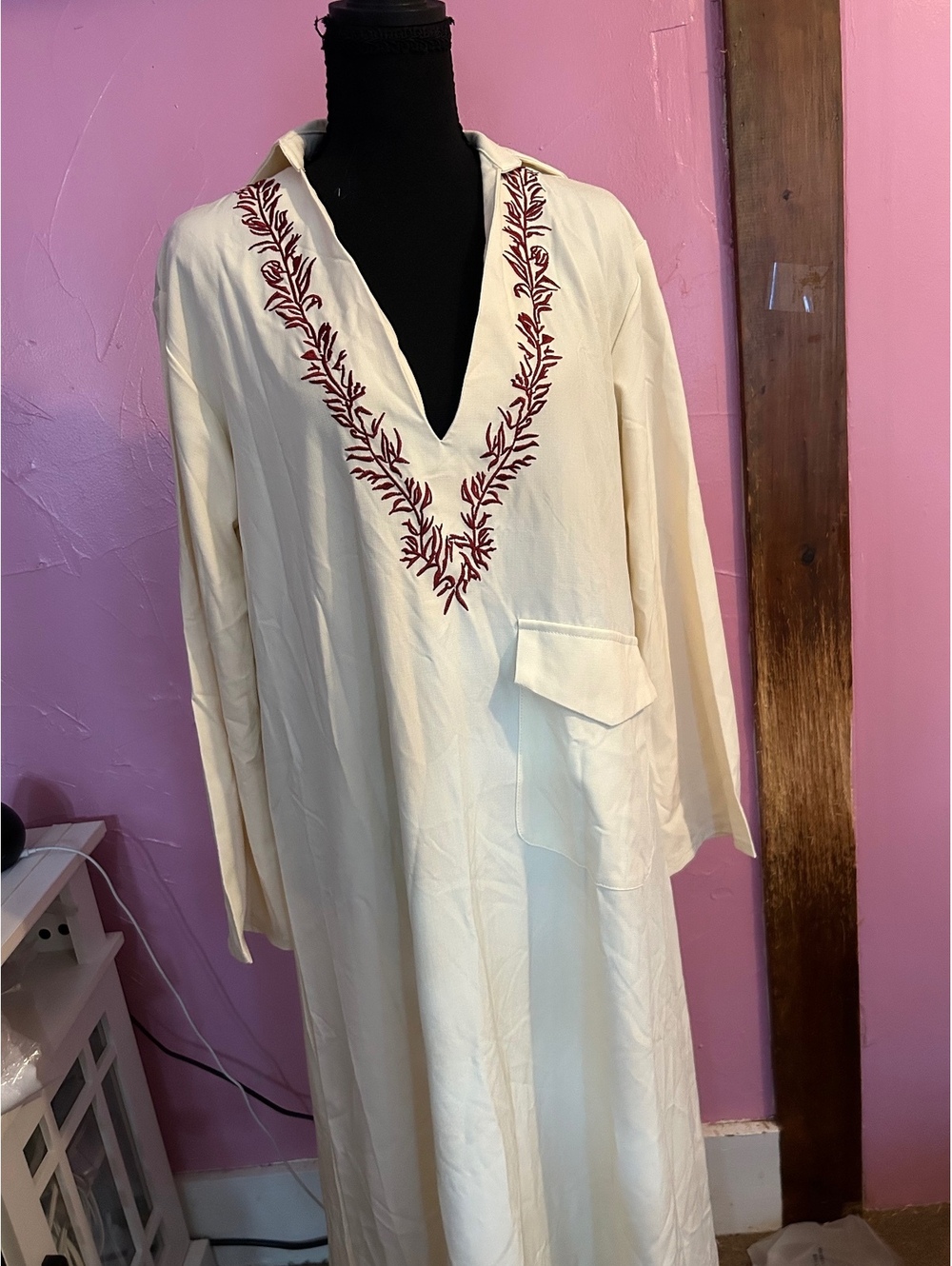 Elegant Cream Long-Sleeve Dress with Red Embroidered V-Neck and Side Flap Pocket